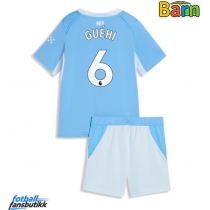 Manchester City Marc Guehi #6 Hjemmedraktsett Barn 2026-27 Kortermet (+ Korte bukser)